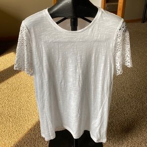 Michael Kors white t shirt with lace sleeves.  Gently used